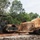 Soldiers from the 130th Engineer Brigade, TNI conducts joint road repair Soldiers from the 130th Engineer Brigade, TNI conducts joint road repair