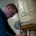 USS Ronald Reagan (CVN 76) Sailors inspect water heater