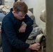 USS Ronald Reagan (CVN 76) Sailors inspect water heater