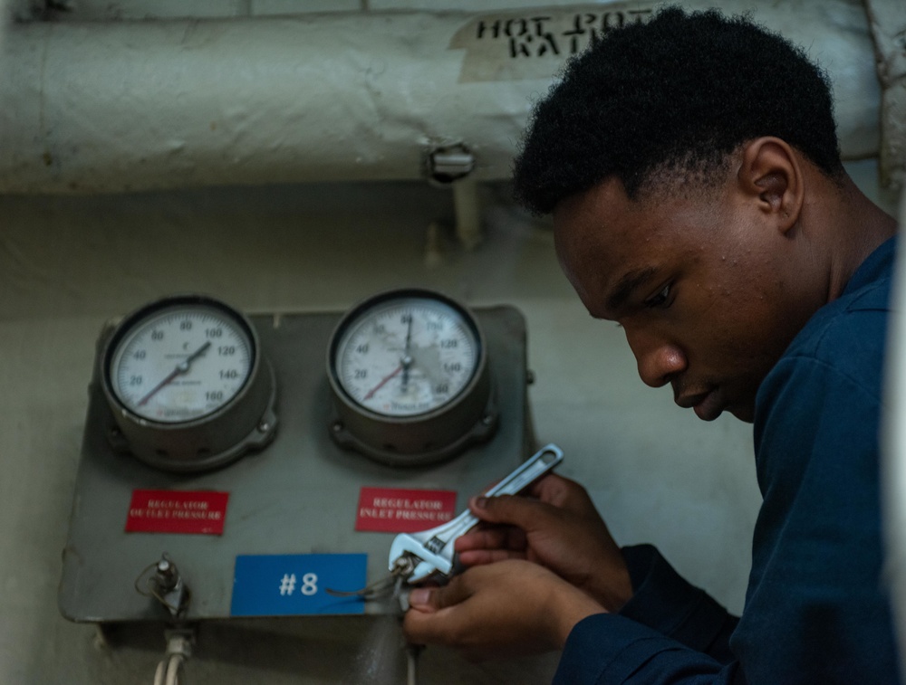 USS Ronald Reagan (CVN 76) Sailors inspect water heater