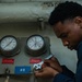 USS Ronald Reagan (CVN 76) Sailors inspect water heater