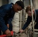 USS Ronald Reagan (CVN 76) Sailors inspect water heater