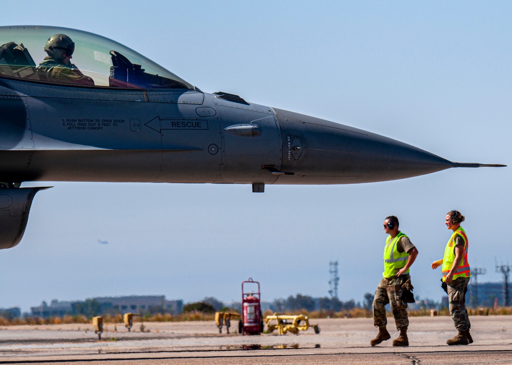 F-16 Fighting Falcons and F-18 Flight Operations