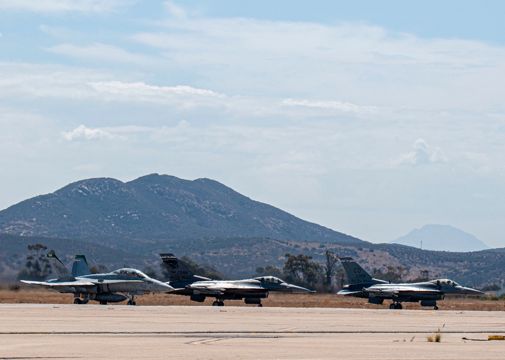 F-16 Fighting Falcons and F-18 Flight Operations