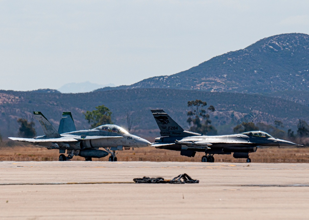 F-16 Fighting Falcons and F-18 Flight Operations