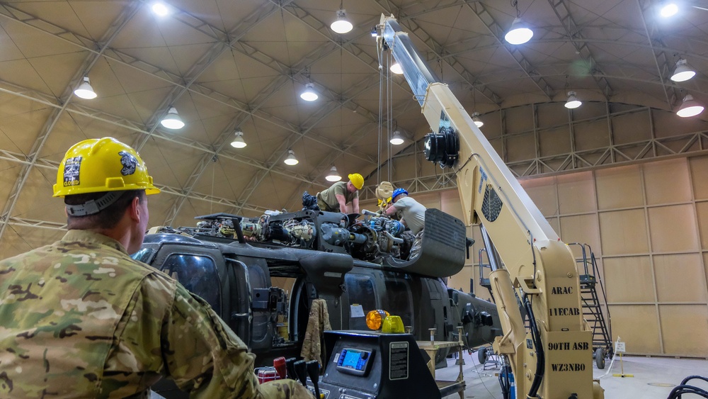 90th ASB, 11th CAB Soldiers install helicopter parts