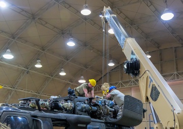 90th ASB, 11th CAB Soldiers install helicopter parts
