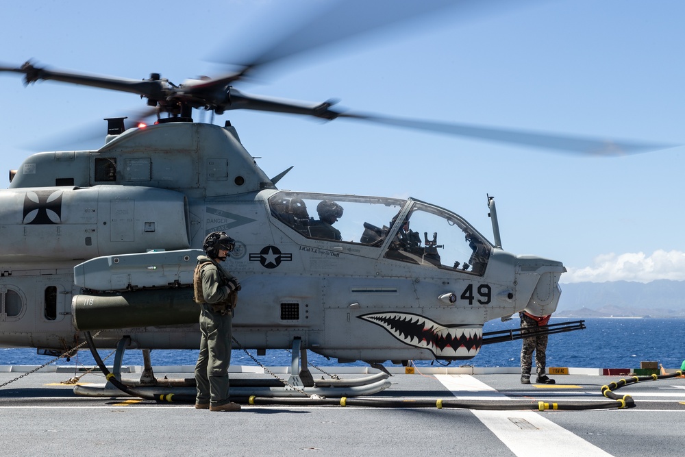 UH-1Y Venom and AH-1Z Viper refuel on HMAS Canberra