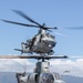 UH-1Y Venom and AH-1Z Viper refuel on HMAS Canberra