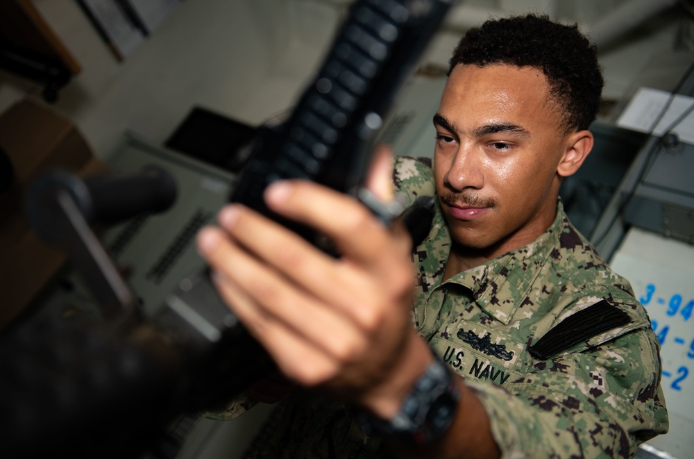 USS Carl Vinson (CVN 70) Sailors Work in Port