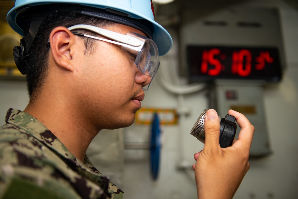 USS Carl Vinson (CVN 70) Sailors Work in Port