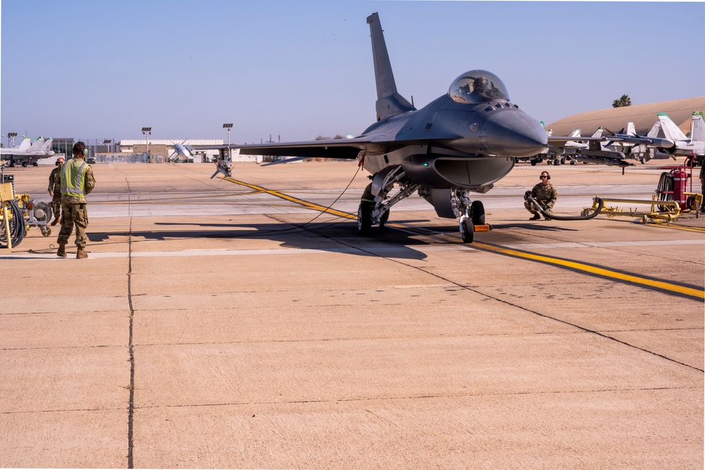 F-16 Fighting Falcons and F-18 Flight Operations