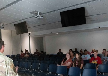 Tech. Sgt. Sean Bird talks with Pyramid Lake High School administration during their tour at the Nevada Air National Guard Base on Aug. 1, 2022