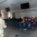 Tech. Sgt. Sean Bird talks with Pyramid Lake High School administration during their tour at the Nevada Air National Guard Base on Aug. 1, 2022