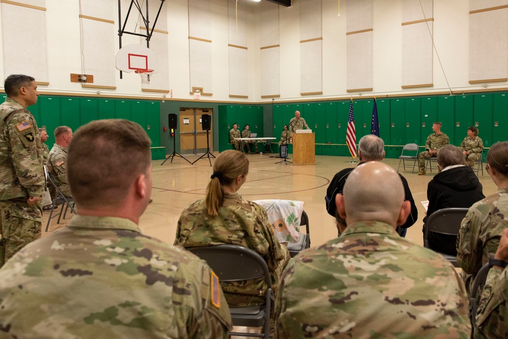 Command Sgt. Maj. Julie Small relinquishes responsibility of 297th Regional Support Group to Command Sgt. Maj. Ryan Weimer