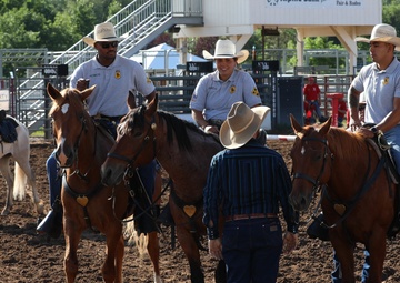 Fort Carson Mounted Color Guard visit the Garfield County Fair 2022