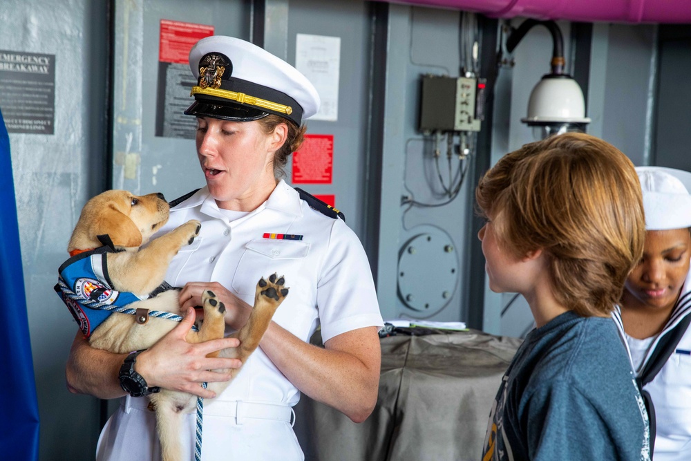 Mutts with a Mission visits USS George H.W. Bush