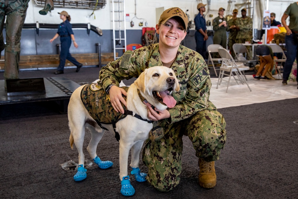 USS George H.W. Bush Recieves Puppy Love and Kisses
