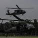 UH-60M Blackhawks landing for cold load training