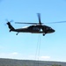 Scouts from the 1/110th Infantry Regiment rappel from a UH-60 Black Hawk during a live fire training exercise.