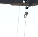 Scouts from the 1/110th Infantry Regiment rappel from a UH-60 Black Hawk during a live fire training exercise.