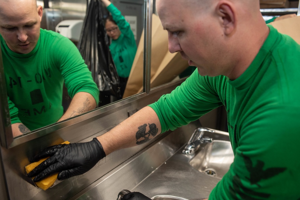 USS Ronald Reagan (CVN 76) Sailors participate in cleaning stations