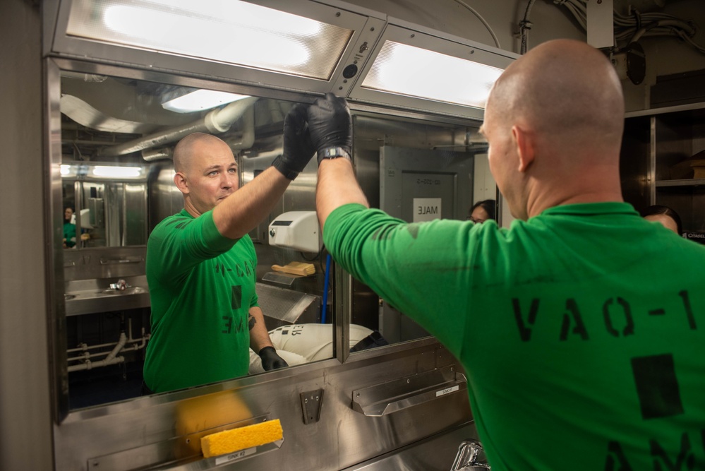 USS Ronald Reagan (CVN 76) Sailors participate in cleaning stations