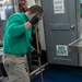 USS Ronald Reagan (CVN 76) Sailors participate in cleaning stations