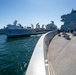 USS Arlington and USS Gunston Hall replenish simultaneously at sea