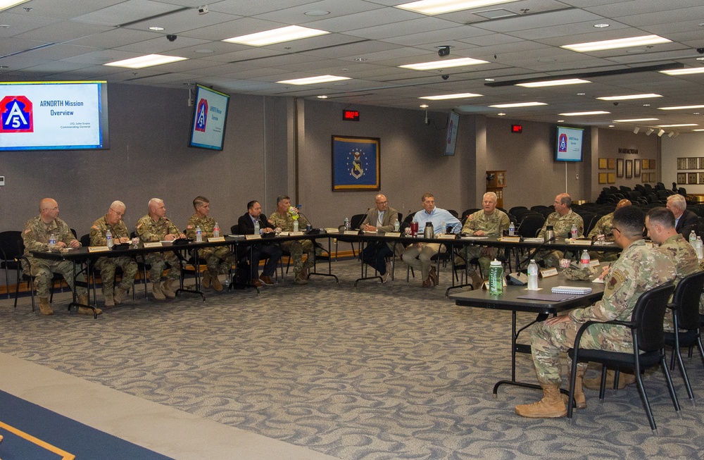 U.S. Army Lt. Gen. John Evans, U.S. Army North Commanding General, and his staff visit with U.S. Air Force Maj. Gen. David Gaedecke, Headquarters Sixteenth Air Force (Air Forces Cyber) Vice Commander, for a cyber-orientation briefing