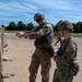 Staff Sgt. Tim Huntley of 12th CST coaches fellow marksmen at annual match
