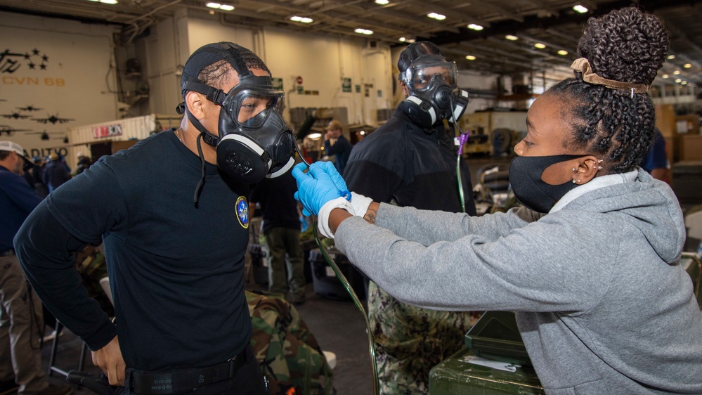 Sailor Tests Gas Mask Seal