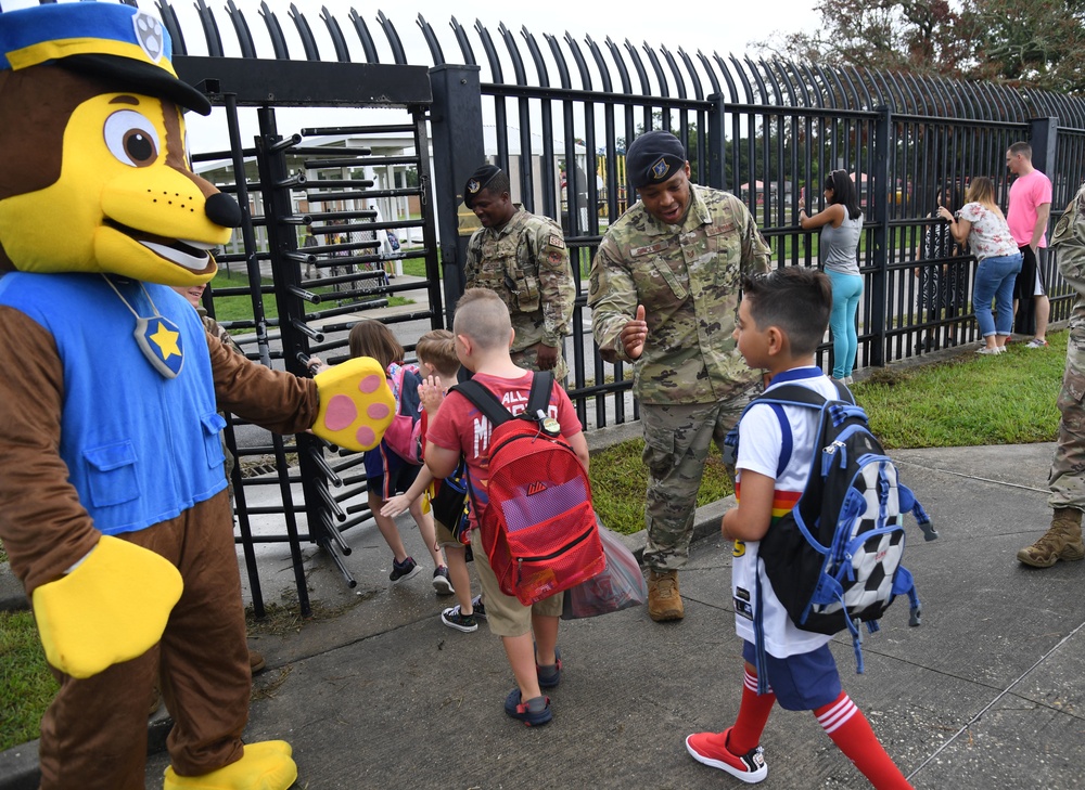 Defenders welcome kids back to school