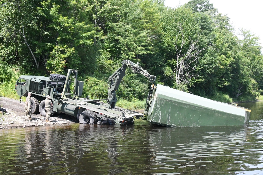 Army engineers building bridges, berms and trails during annual training at Fort Drum