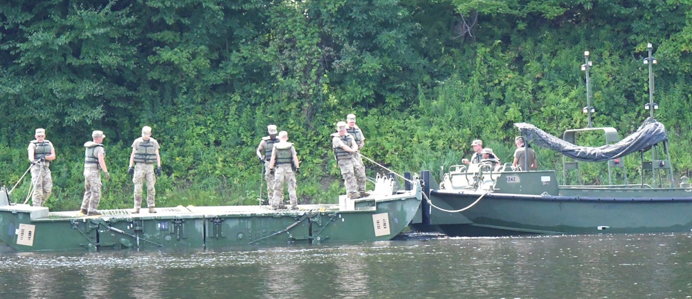 Army engineers building bridges, berms and trails during annual training at Fort Drum