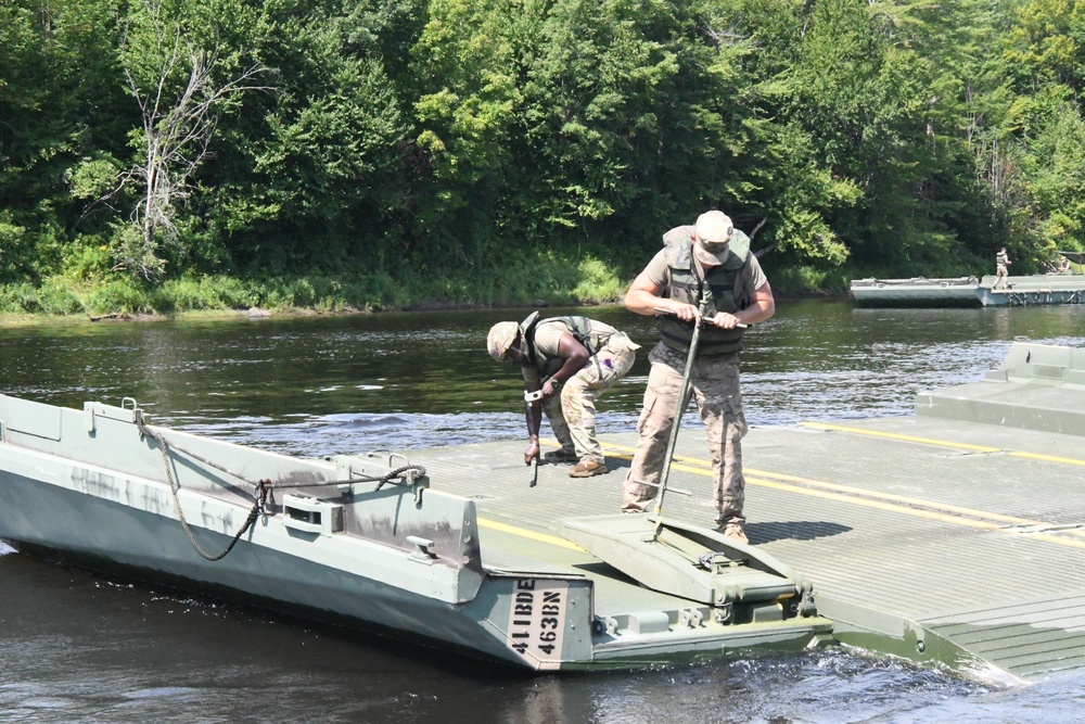 Army engineers building bridges, berms and trails during annual training at Fort Drum