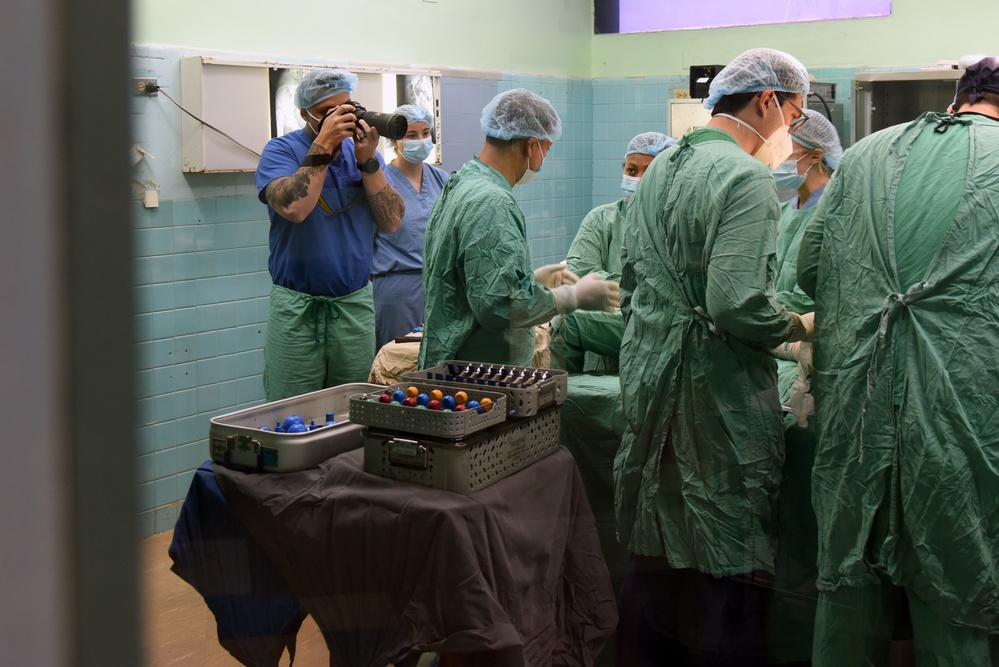 Public Affairs photographing surgery