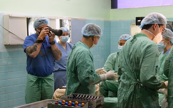 Public Affairs photographing surgery