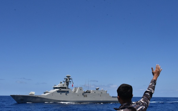 Indonesian Navy Sailor Waves at ARM Benito Juarez