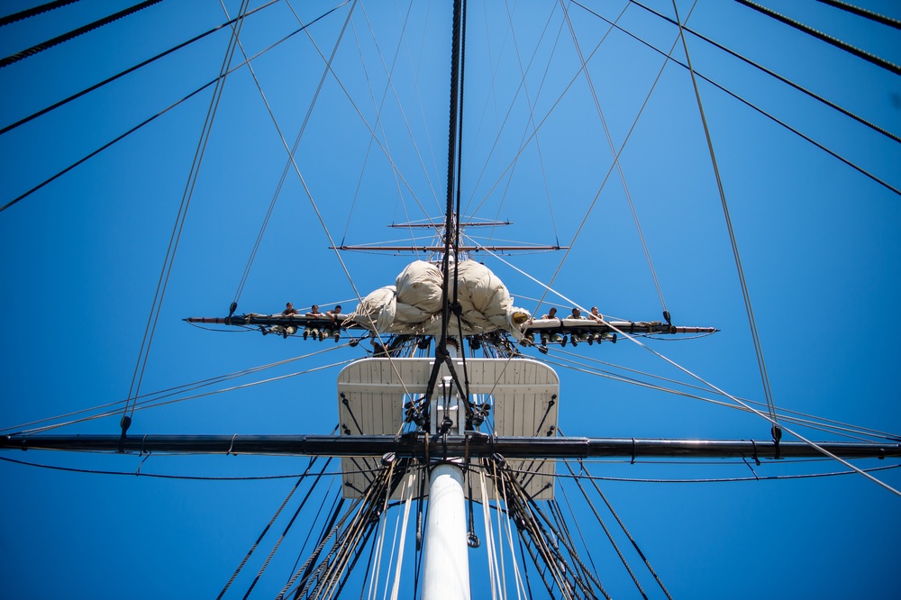 USS Constitution Sailors work aloft