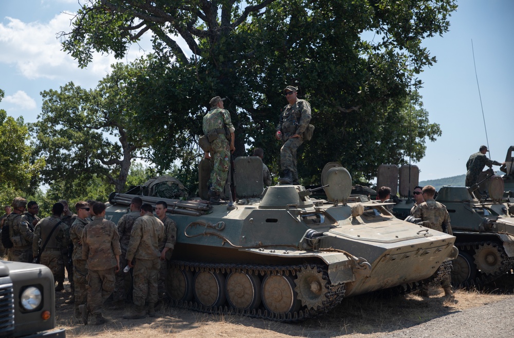 US, UK and Bulgarian soldiers display their military vehicles during Platinum Lion 22