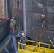 Crew work quickly to repair the upstream navigation lock gate at John Day Lock and Dam, with Portland District, U.S. Army Corps of Engineers, Aug 3.