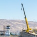 Crew work quickly to repair the upstream navigation lock gate at John Day Lock and Dam, with Portland District, U.S. Army Corps of Engineers, Aug 3.