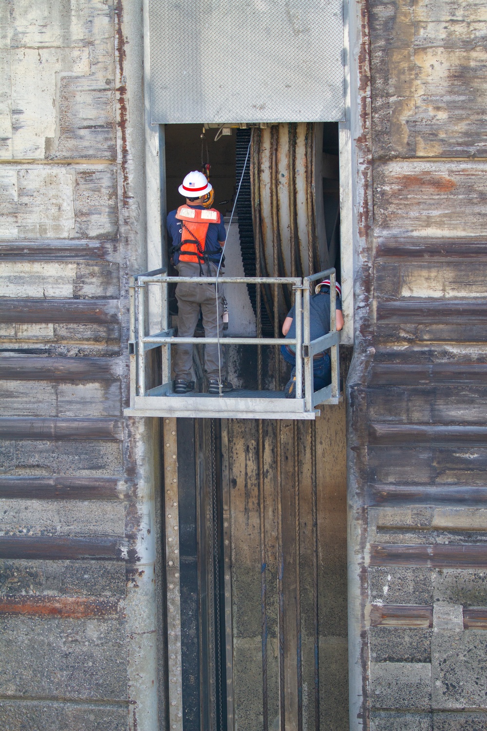 Crew work quickly to repair the upstream navigation lock gate at John Day Lock and Dam, with Portland District, U.S. Army Corps of Engineers, Aug 3.