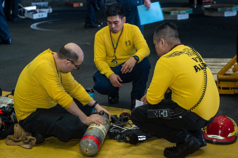 USS Ronald Reagan (CVN 76) Sailors conduct firefighting equipment inspection