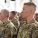 Airmen listen to their new commander