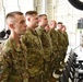 Airmen stand in formation for new commander