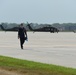 Base Honor Guard member walks on flight line