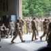 Soldiers check in to the Joint Reception, Staging, Onward movement, and Integration site for Northern Strike 22