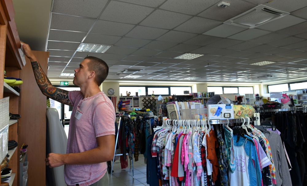 NSA Naples' Sailors Volunteer for NMCRS Thrift Shop Re-Opening